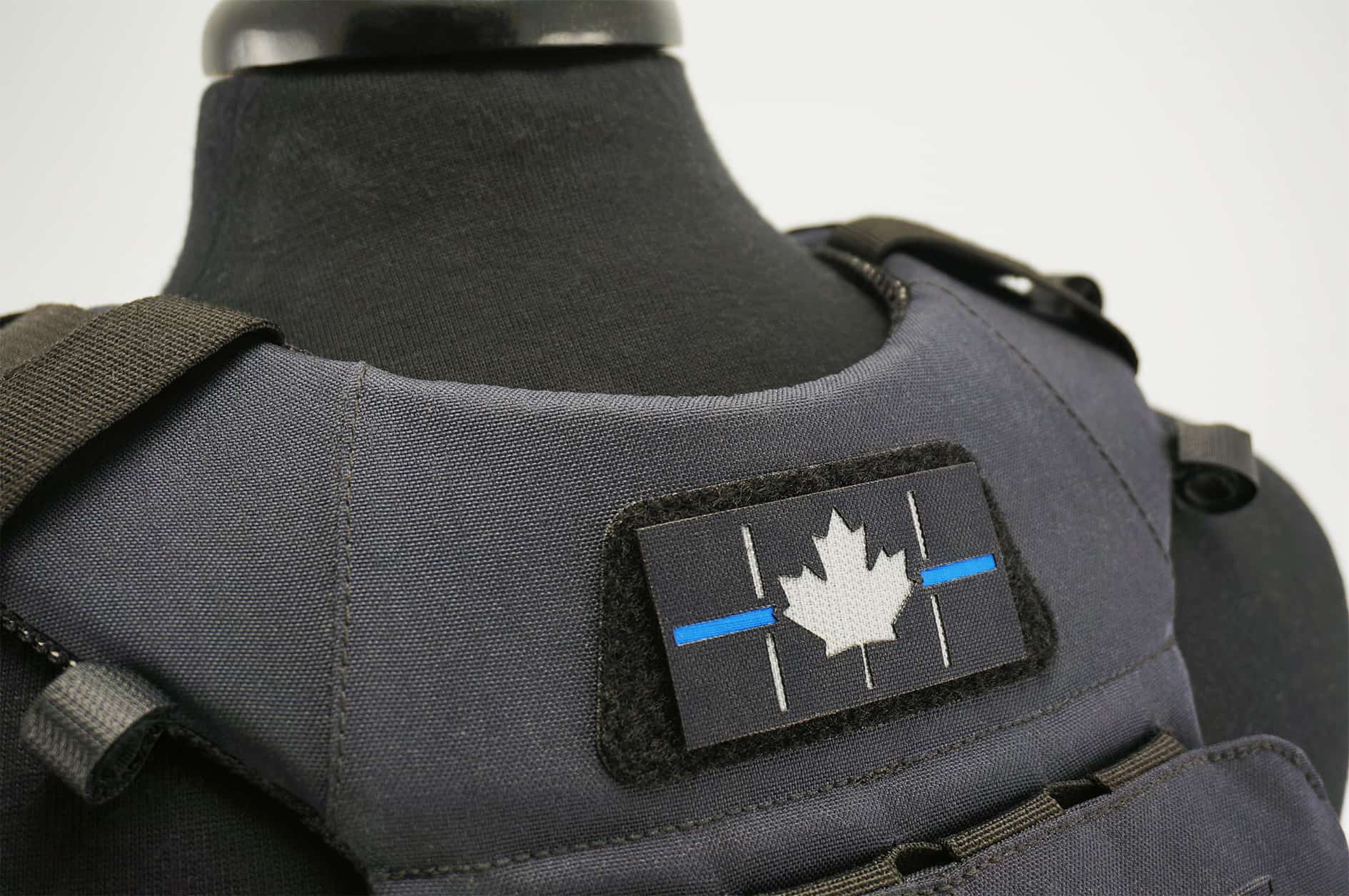 Canadian Thin Blue Line Patch attached to plate carrier